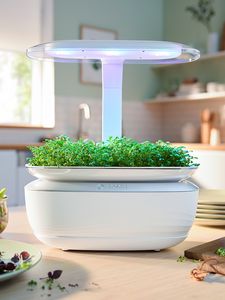 SmartGrow Life with microgreens tray on a kitchen worktop.