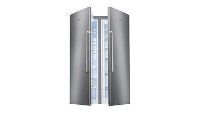 Half-open Bosch fridge freezer in grey with two doors.