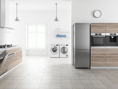 Bosch appliances in a modern white kitchen.