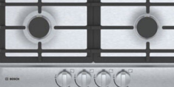 Overhead view of a gas cooktop with four burners