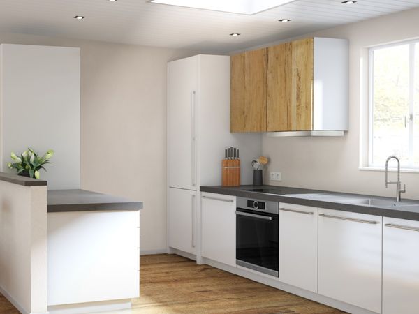 Small galley kitchen in white with a skylight, small overhead lights and kitchen window.
