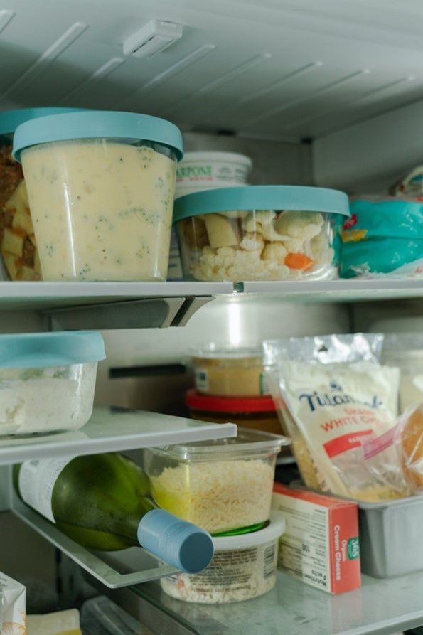 Vegetables and soup in a refrigerator