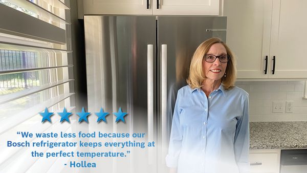 Customer standing in front of her Bosch refrigerator