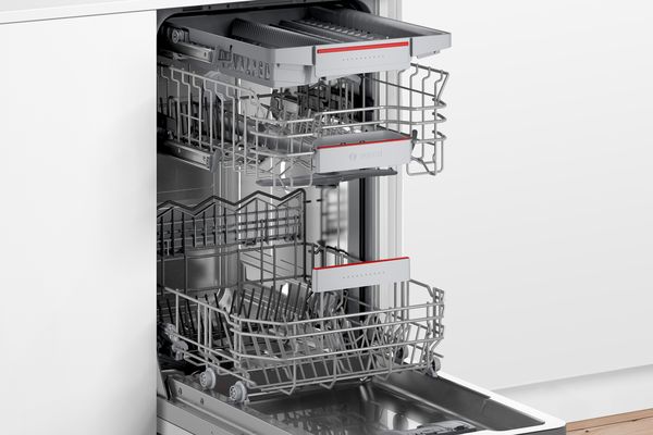 Side view dishwasher with door slightly open looking in
