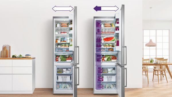 Zwei Edelstahl Kühl-Gefrier-Kombinationen veranschaulichen den Größenunterschied zwischen Geräten mit 60 cm Breite und 70 cm Breite.