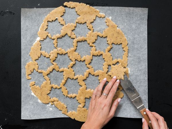 cookie cutter cutting out dough