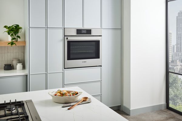 Wall oven with food on counter