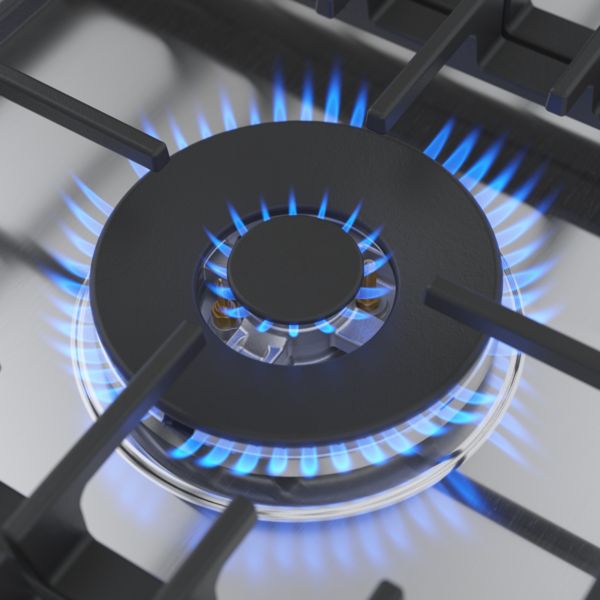 A pan support unattached from a gas hob.