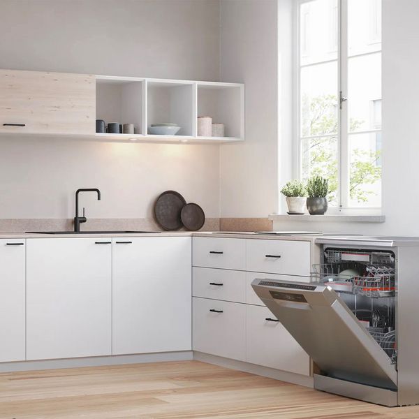 Clean white open kitchen space