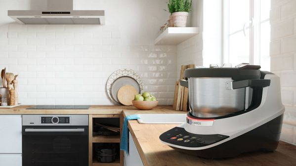 The Bosch Cookit standing on a kitchen shelf.