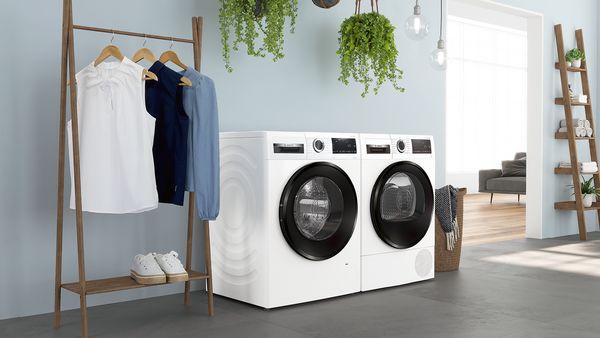 Side-by-side Bosch washing machine and dryer.