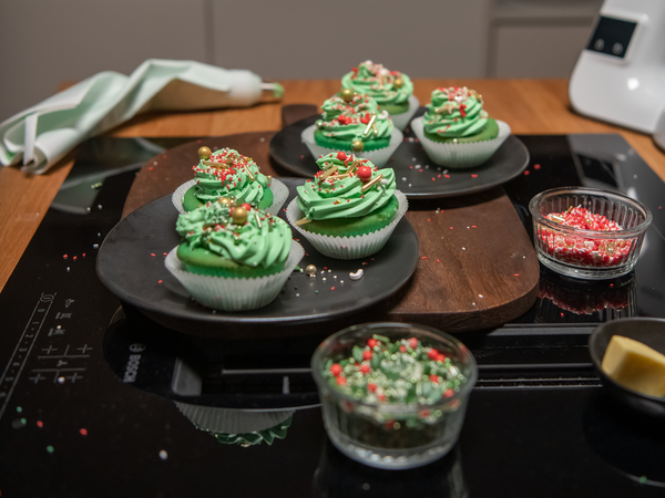 Holiday themed cupcakes on a table