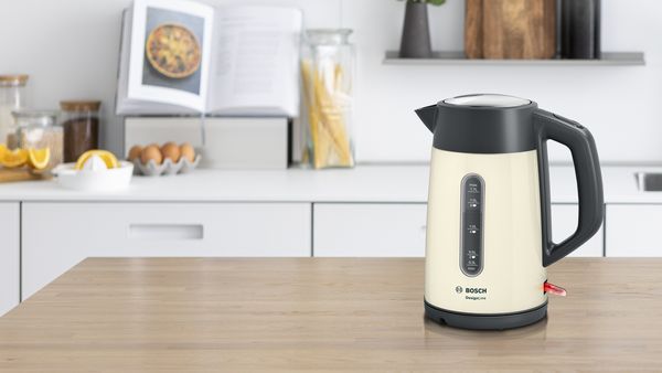 White Bosch kettle on the kitchen counter in a light kitchen design 