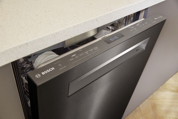 Bosch black dishwasher with brown cabinets