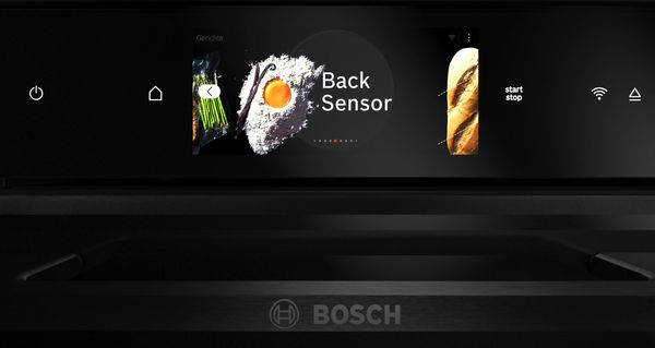 Four Série 8. Focus sur l'écran tactile TFT Pro affichant le menu de sélection du mode de chauffage.