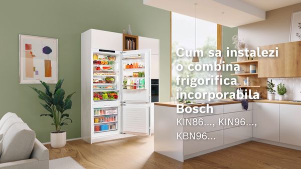 Bucătărie modulară albă cu combină frigorifică încorporabilă XXL şi siglă Bosch.