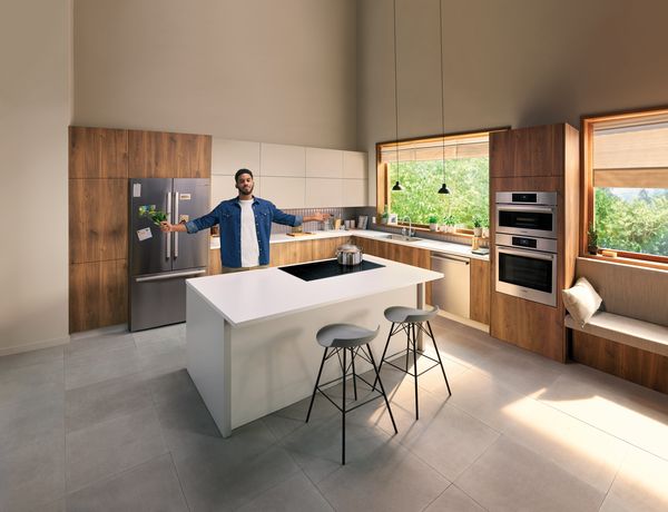 Bosch kitchen with person holding arms up