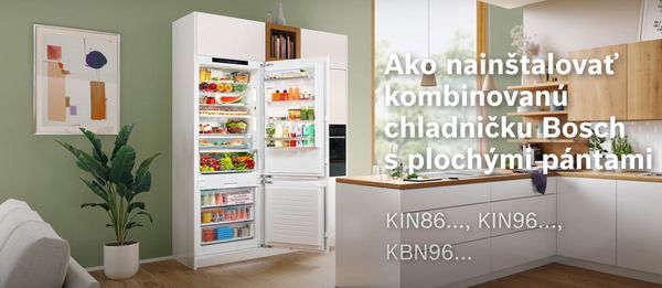 White built-in kitchen with an integrated XXL fridge freezer and Bosch logo.