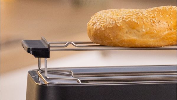 Bread warming on top of toaster