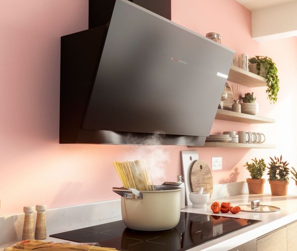 Freestanding Extractor Hood in pink kitchen design