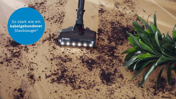 Video über die Fußbodenreinigung mit dem Bosch Unlimited 7 Akku-Staubsauger mit beleuchteter Staubsaugerdüse.