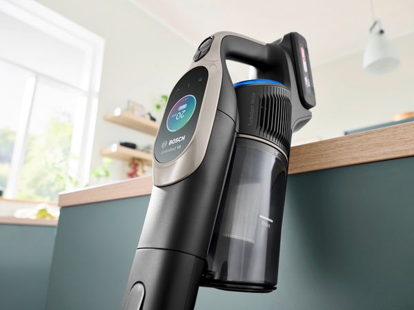 Unlimited 10 vacuum cleaner leant against a kitchen worktop