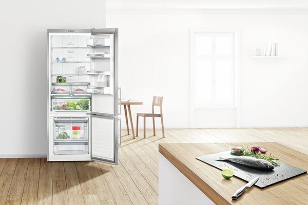 Bosch freestanding Fridge freezer stood in open plan kitchen