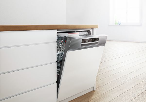 Bosch Integrated Dishwasher ajar in open plan kitchen