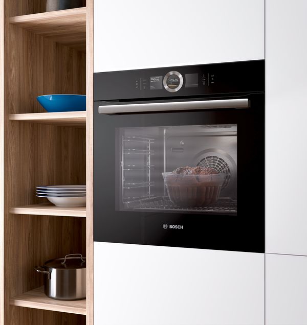 A Bosch convection microwave oven in a modern kitchen.