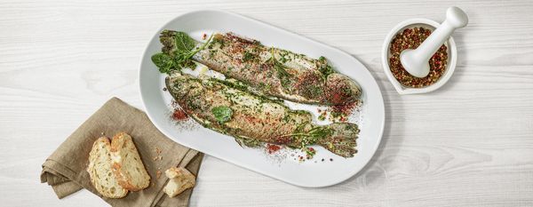 Baked trout with herbs