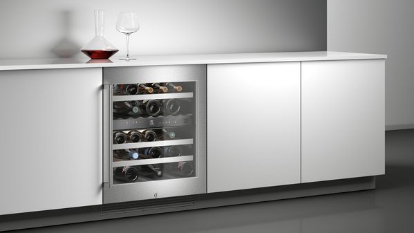 wine cabinet displaying the stainless steel glass front