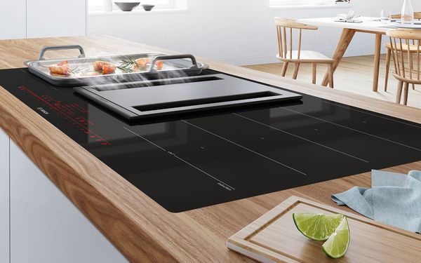 Bosch induction hob on kitchen island and built in extractor hood
