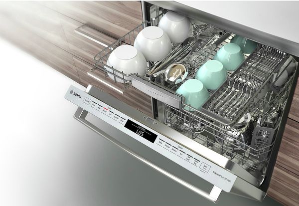 Opened dishwasher with top rack pulled out