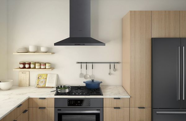 Bosch 30" black stainless steel cooktop installed in kitchen