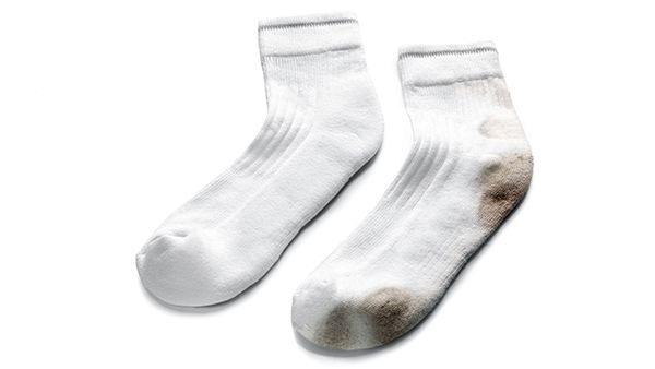 One soiled and one clean sock