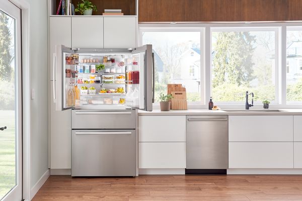 high quality bosch stainless steel refrigerator open - kitchen shot