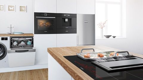 Open Kitchen with Bosch dishwasher, washing, fridge-freezer and hob working.