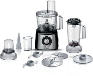 A compact MultiTalent 3 food processor in white, making dough.
