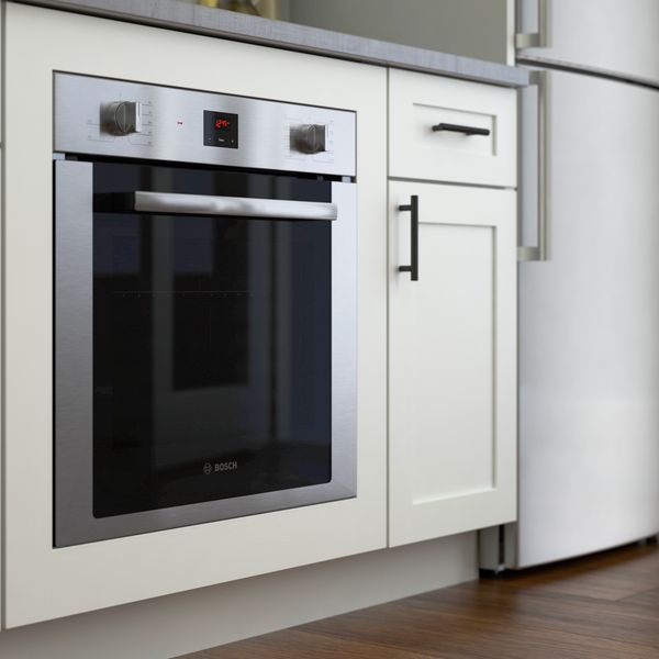 Bosch 24" wall oven in a small space kitchen design 