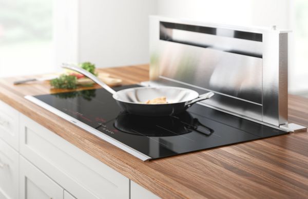 Bosch induction cooktop close up on pan