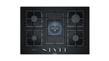 A 75-cm wide, 5-burner black gas hob from Bosch. Dual-flame wok burner in the centre is lit.