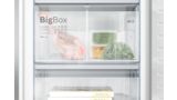 Close up of a Bosch freezer full of meat and vegetables. BigBox shows large freezer capacity.