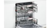 Open Bosch dishwasher shows three rack system for dishes, pots and cutlery.