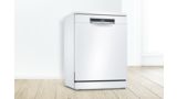 White freestanding dishwasher from Bosch in a bright, white space.