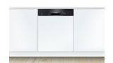 Bosch built-in dishwasher with a black control panel and white front.