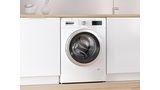 Onderbouw frontlader-wasmachine van Bosch in een moderne witte keuken