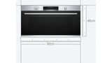 A Bosch XL oven with a blue measuring tape below.