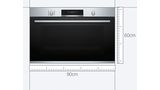 A Bosch XXL oven with a blue measuring tape below.