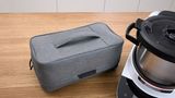 Grey tool bag next to Cookit on the worktop.