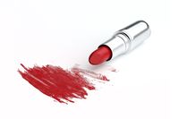 Åpen rød leppestift med kruseduller foran som symboliserer AntiStain 